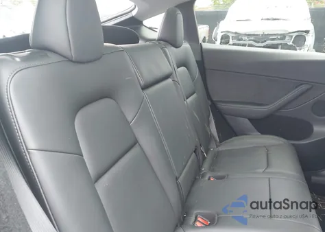 2024 Tesla Model Y из США, поврежденный, VIN 7SAYGDED5RF111338